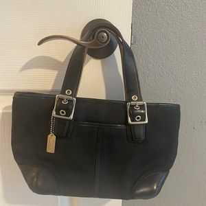 Coach. Small black bag. Rarely used.